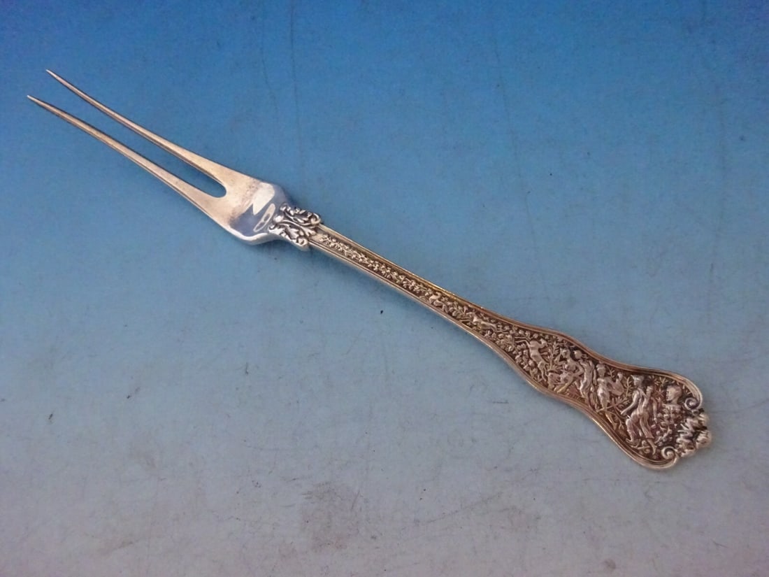 Tiffany & Co Olympian Sterling Silver Fruit Fork 2-Tine 6.25 Inch Antique: Tiffany & Co Olympian Sterling Silver Fruit Fork 2-Tine 6.25 Inch Antique This exquisite fruit fork from the Olympian pattern is crafted by Tiffany & Co. Made of high-quality sterling silver, it featu