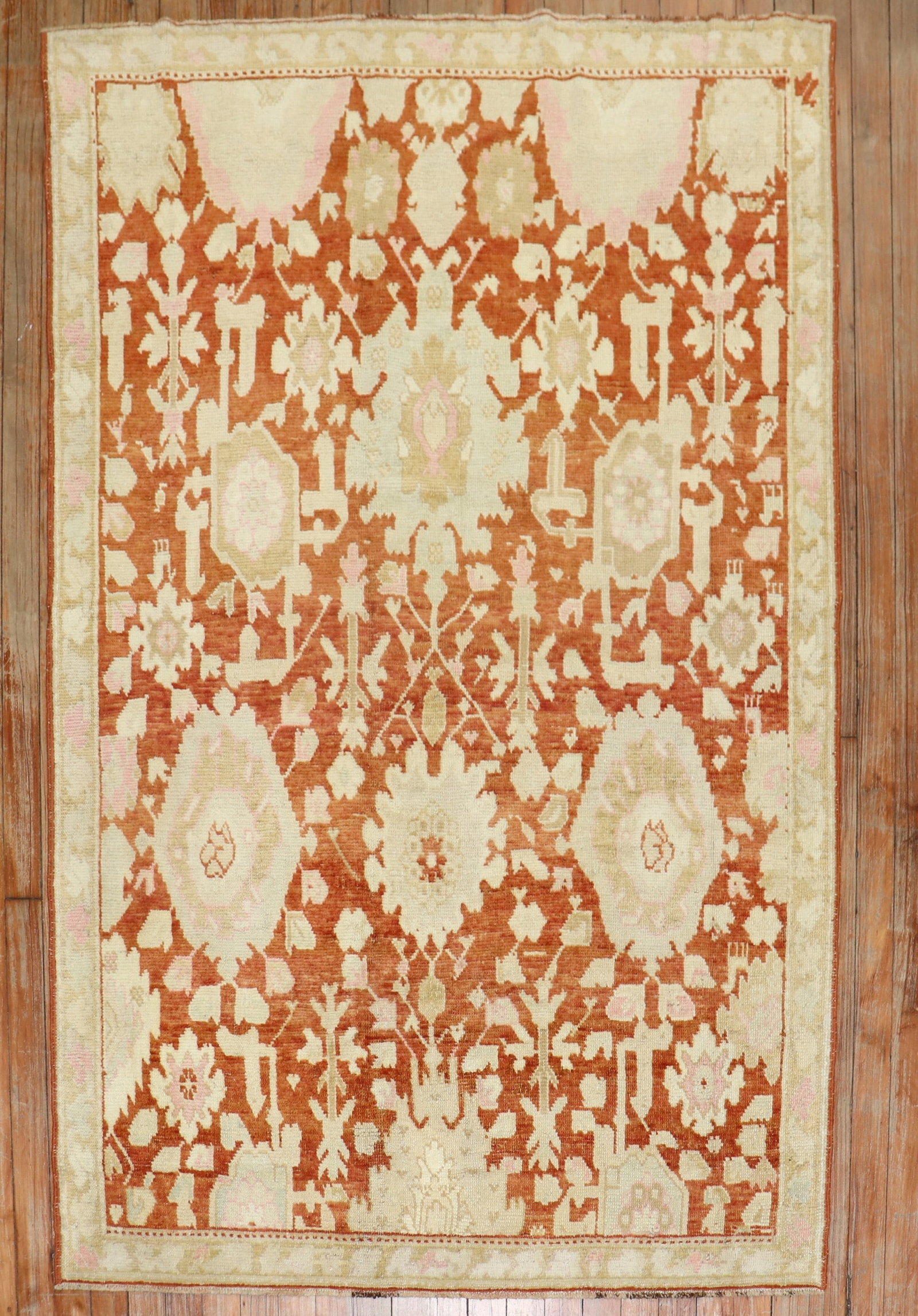 3' 10" x 5' 9" Russian Karabagh Accent Rug 1930s: 3' 10" x 5' 9" Russian Karabagh Accent Rug 1930s Antique Karabagh rug from the 1930s featuring a large-scale all-over design with ivory, brown, and pink accents on a brown ground. A pre-owned accent r