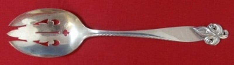 Wallace Orchid Elegance Sterling Silver Slotted Serving Spoon 8 3/8: Wallace Orchid Elegance Sterling Silver Slotted Serving Spoon 8 3/8 Wallace Orchid Elegance sterling silver original serving spoon with a pierced design. It dates to the post-1940 period, was made in 