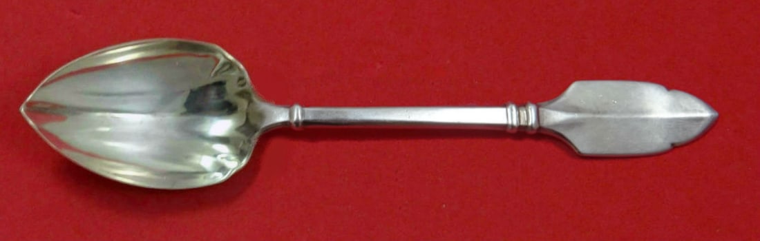 Graff W and D Robert Bruce Sterling Silver Fluted Grapefruit Spoon 5 3/4": Graff W and D Robert Bruce Sterling Silver Fluted Grapefruit Spoon 5 3/4" Custom-made fluted grapefruit spoon in the Robert Bruce pattern by Graff W & D. Crafted in sterling silver, this pre-owned pie