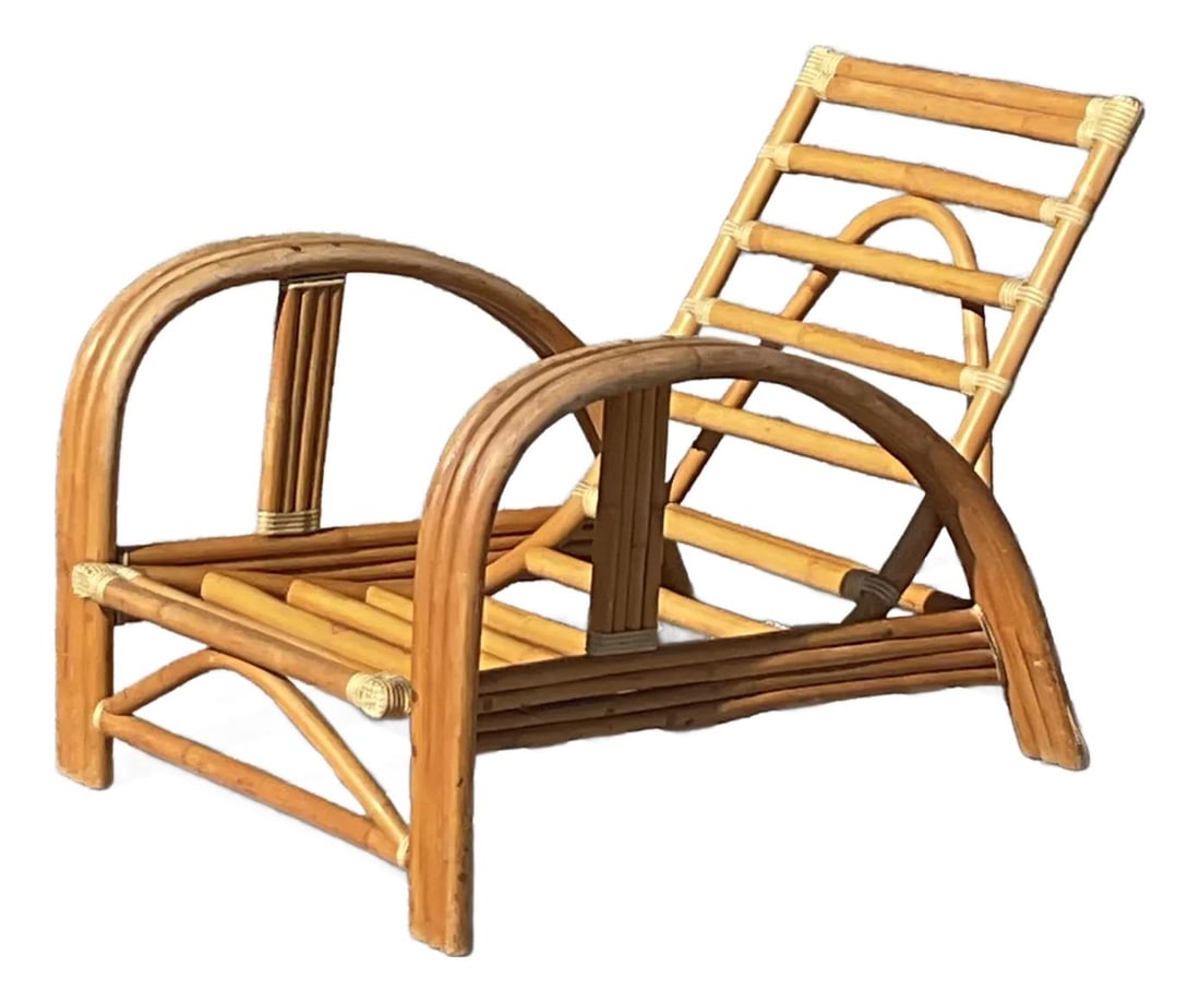 Vintage Bent Rattan Lounge Chair Coastal Charm 29W x 21.5D x 28H: Vintage Bent Rattan Lounge Chair Coastal Charm 29W x 21.5D x 28H Embrace the relaxed coastal charm of this vintage bent rattan lounge chair, an exquisite statement piece for any setting. Its flowing, 