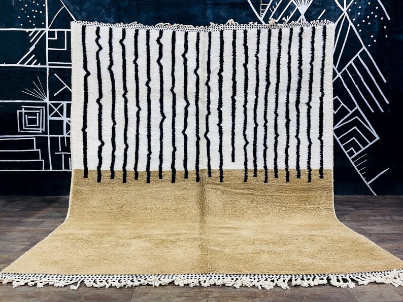 Authentic Handmade Moroccan Berber Wool Rug 9.84 x 6.56 Feet: Authentic Handmade Moroccan Berber Wool Rug 9.84 x 6.56 Feet Enhance your living space with this stylish and authentic handmade Moroccan Berber wool rug. Crafted with care in the scenic Atlas Mountain