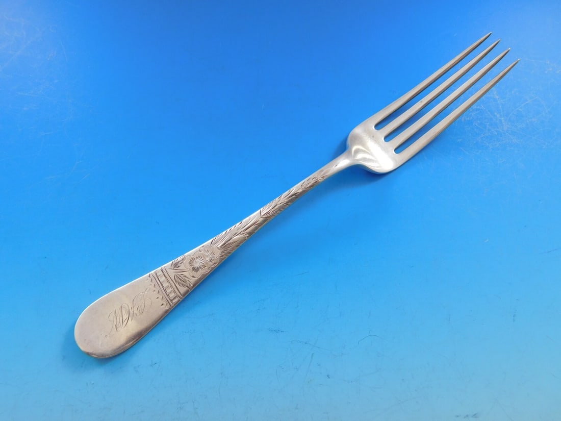 Sterling Silver Dinner Fork Brite Cut Pattern 7 1/2 Retailed by Williams: Sterling Silver Dinner Fork Brite Cut Pattern 7 1/2 Retailed by Williams This is a brite-cut sterling silver dinner fork retailed by Williams. It is monogrammed, with monos varying, and is described a
