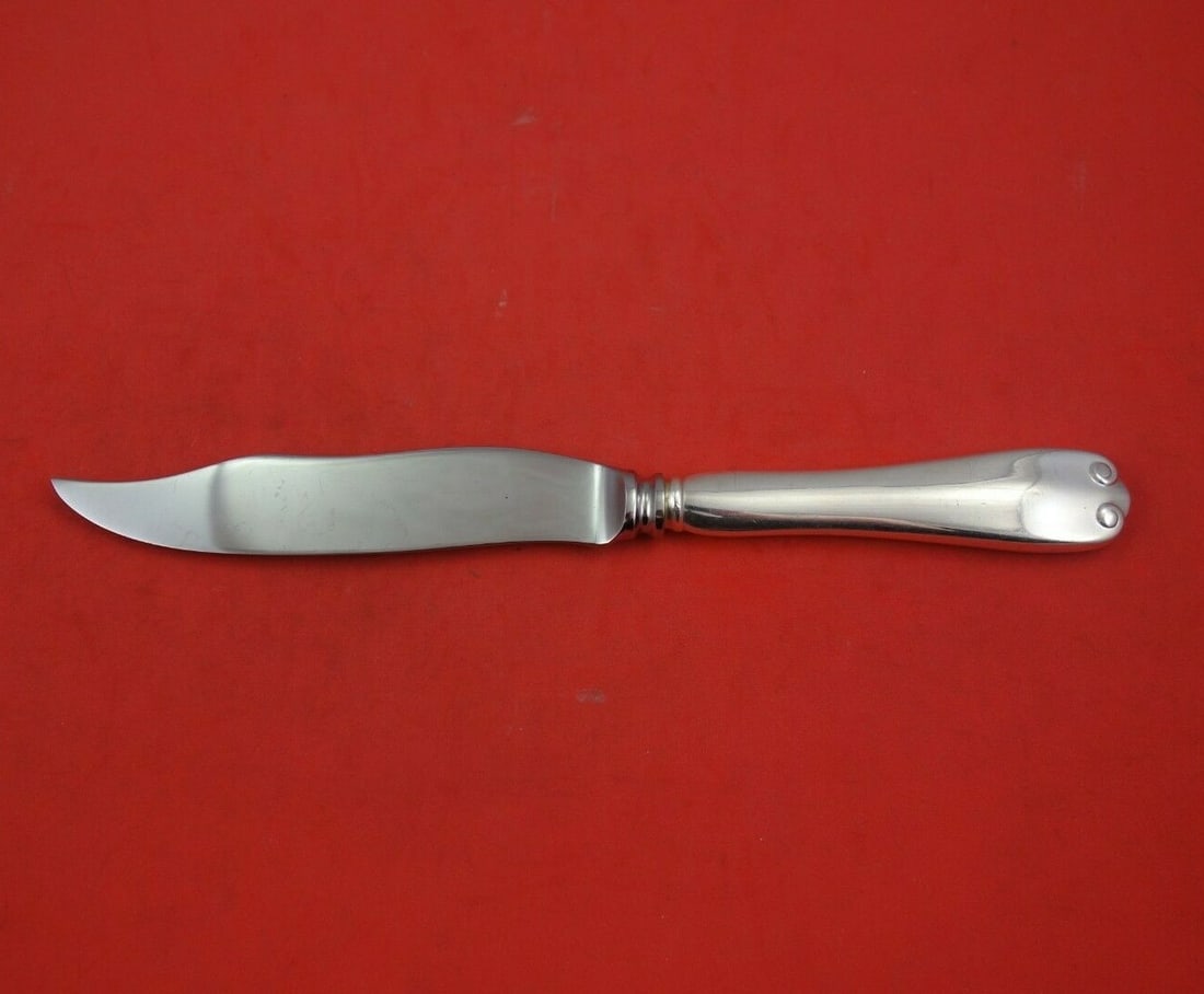 Tiffany & Co Flemish Sterling Silver Fish Knife 8 1/4": Tiffany & Co Flemish Sterling Silver Fish Knife 8 1/4" This exquisite Flemish fish knife by Tiffany & Co. showcases timeless elegance with its sterling silver hollow handle and a durable stainless ste