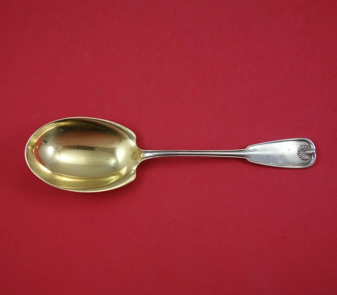 Tiffany & Co Palm Pattern Sterling Silver Gold Washed Serving Spoon 7 7/8": Tiffany & Co Palm Pattern Sterling Silver Gold Washed Serving Spoon 7 7/8" This exquisite serving spoon from Tiffany & Co. features the elegant Palm pattern and is crafted from sterling silver with a 