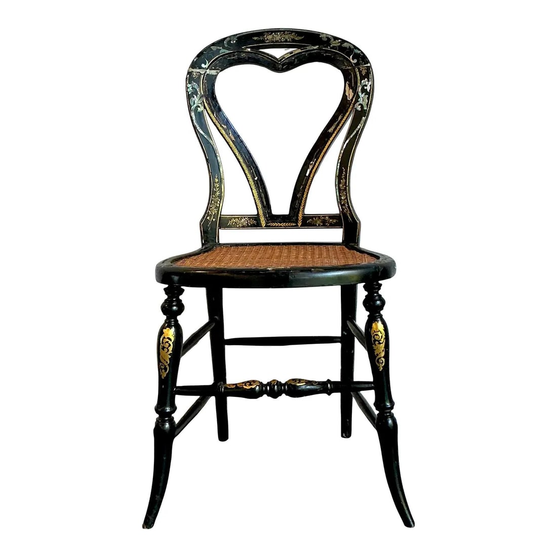 Victorian Style Papier-Mache Side Chair with Gilt and Mother-of-Pearl Details: Victorian Style Papier-Mache Side Chair with Gilt and Mother-of-Pearl Details This vintage Regency side chair features a heart-shaped back and elegantly turned legs, crafted from ebonized wood or papi