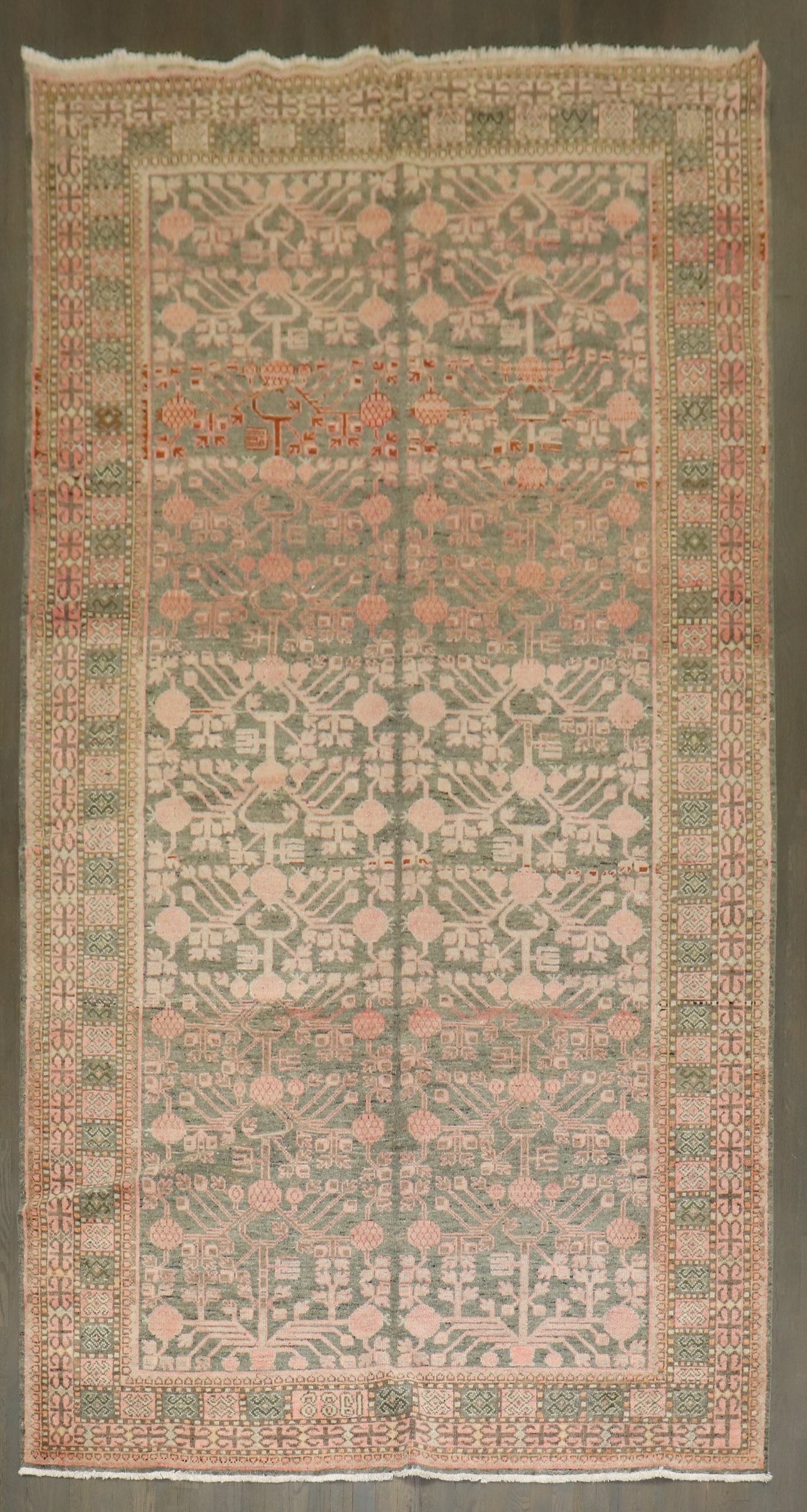 6' 6" x 12' 9" Khotan Gallery Rug Gray Salmon Pomegranate Motif: 6' 6" x 12' 9" Khotan Gallery Rug Gray Salmon Pomegranate Motif Vintage East Turkestan Khotan rug from the 1930s featuring a gray salmon color palette and an allover pomegranate motif. This pre-owned 