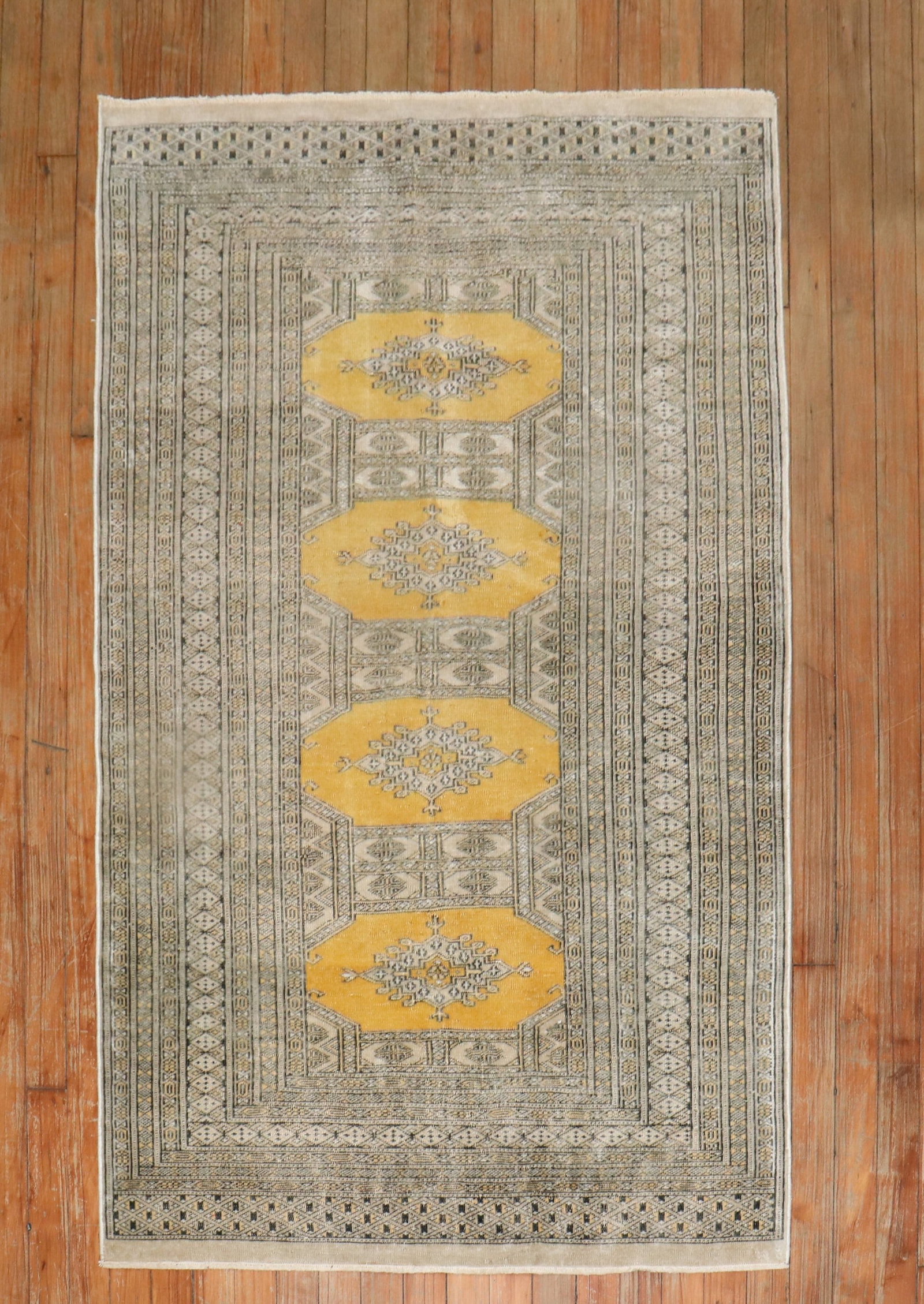 3' 1" x 5' 11" Small Turkeman Bokhara Area Rug: 3' 1" x 5' 11" Small Turkeman Bokhara Area Rug Vintage Bokhara rug with a geometric design and multiple surrounding borders. This pre-owned small rug is identified as Bokhara, Turkeman. Specifications