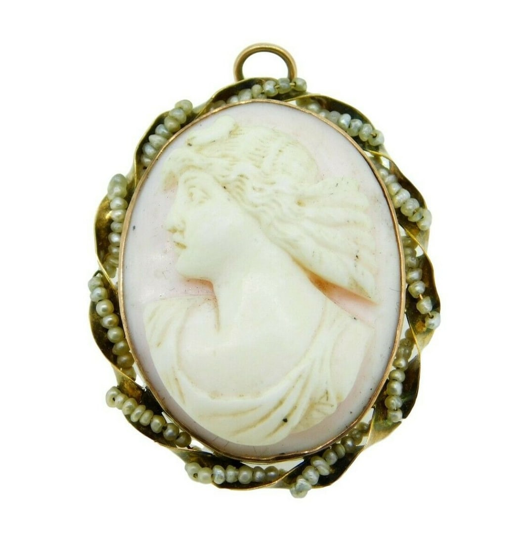Antique 10k Yellow Gold Angel Skin Coral Cameo Pin Pendant: Antique 10k Yellow Gold Angel Skin Coral Cameo Pin Pendant This exquisite 10k Yellow Gold Angel Skin Conch Shell Cameo Pin Pendant is a remarkable antique piece dating back to the 1890s. Crafted from 
