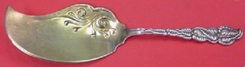 Tiffany and Co Ailanthus Sterling Silver Gold Washed Ice Cream Slice 11 3/8 Inch: Tiffany and Co Ailanthus Sterling Silver Gold Washed Ice Cream Slice 11 3/8 Inch This sterling silver ice cream slice features the Ailanthus pattern by Tiffany and Co. It measures 11 3/8 inches in len