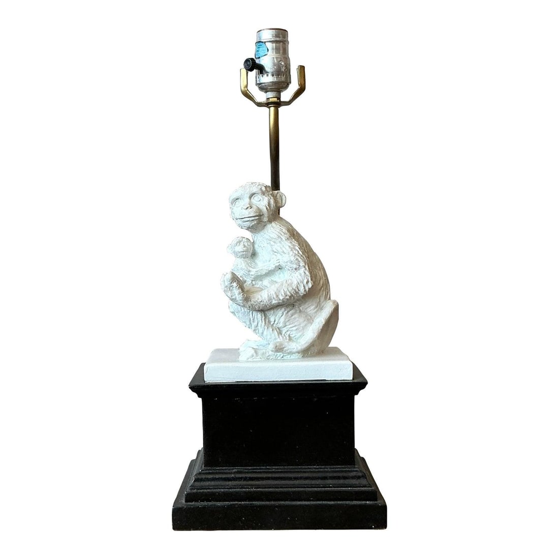 White Plaster Monkey Table Lamp with Brass Neck and Wood Base: White Plaster Monkey Table Lamp with Brass Neck and Wood Base This vintage plaster monkey table lamp brings a playful yet sophisticated touch to any space. Inspired by the French "Singerie" tradition 