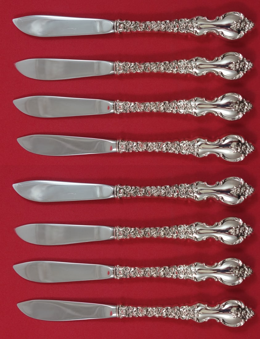 Set of 8 Du Barry sterling silver butter spreaders 6 1 2 inch: Set of 8 Du Barry sterling silver butter spreaders 6 1 2 inch This set includes eight Du Barry butter spreaders by International Silver, crafted with sterling silver hollow handles and stainless steel