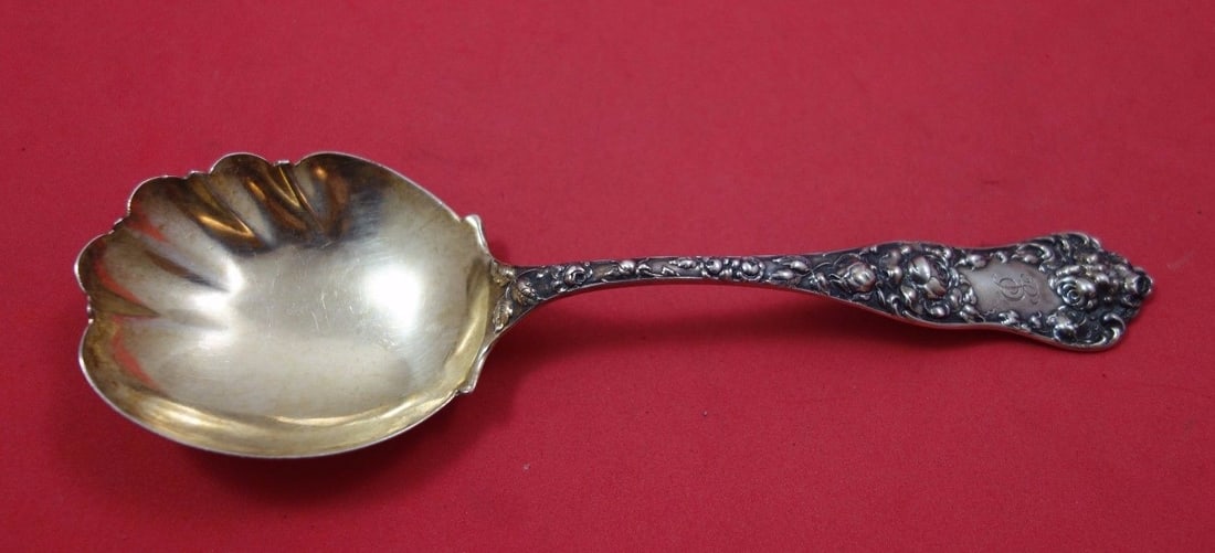 Shiebler American Beauty sterling preserve spoon gold washed 7 1/4: Shiebler American Beauty sterling preserve spoon gold washed 7 1/4 A Shiebler American Beauty preserve spoon made of sterling silver with a gold-washed finish. It is monogrammed, with monos varying, a