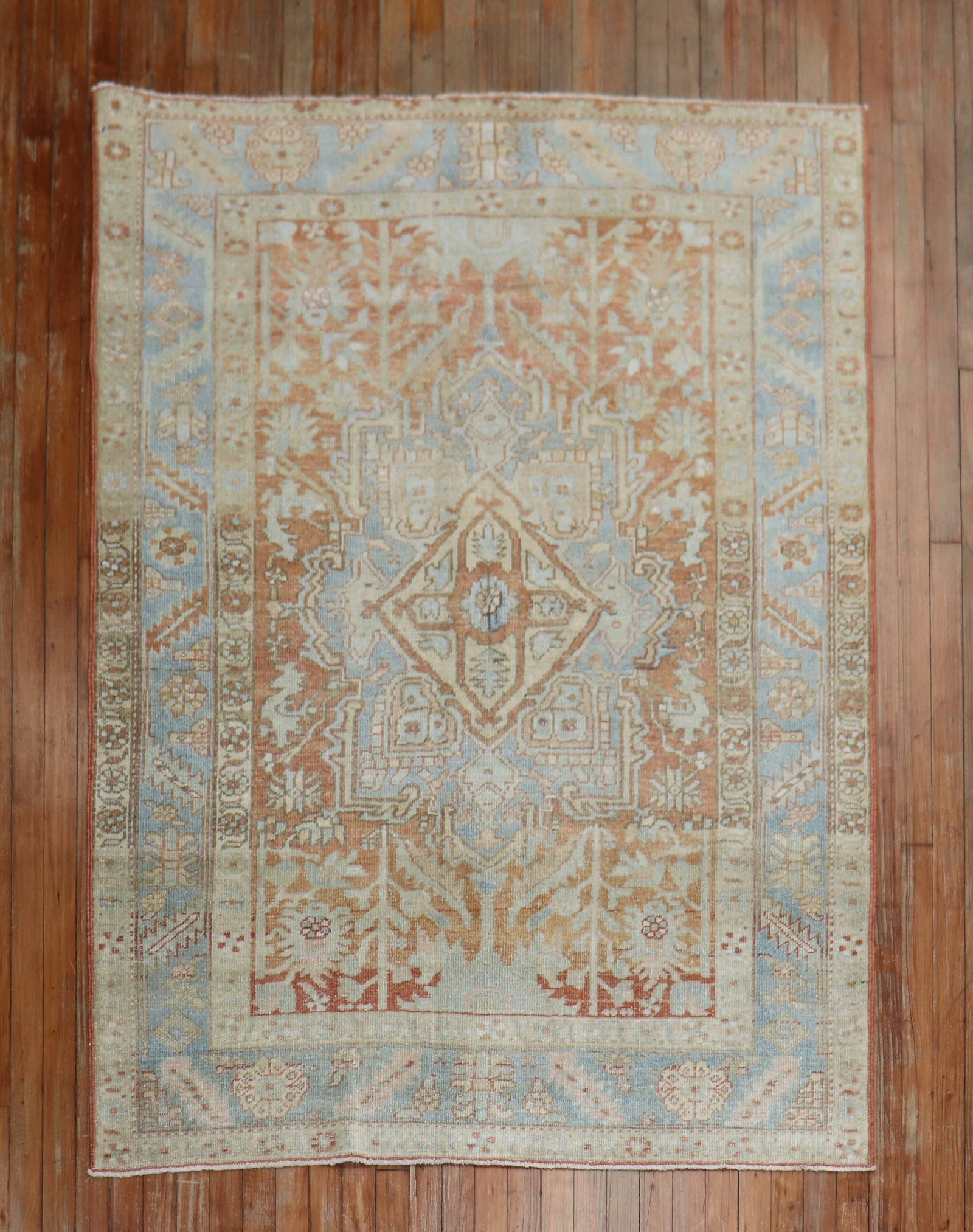 4' 6" x 6' 3" Persian Serapi Heriz Accent Rug Apricot Blue: 4' 6" x 6' 3" Persian Serapi Heriz Accent Rug Apricot Blue 1930s Persian Heriz rug in apricot with light blue accents. Classified as a Serapi/Heriz accent rug, this pre-owned piece offers a traditiona