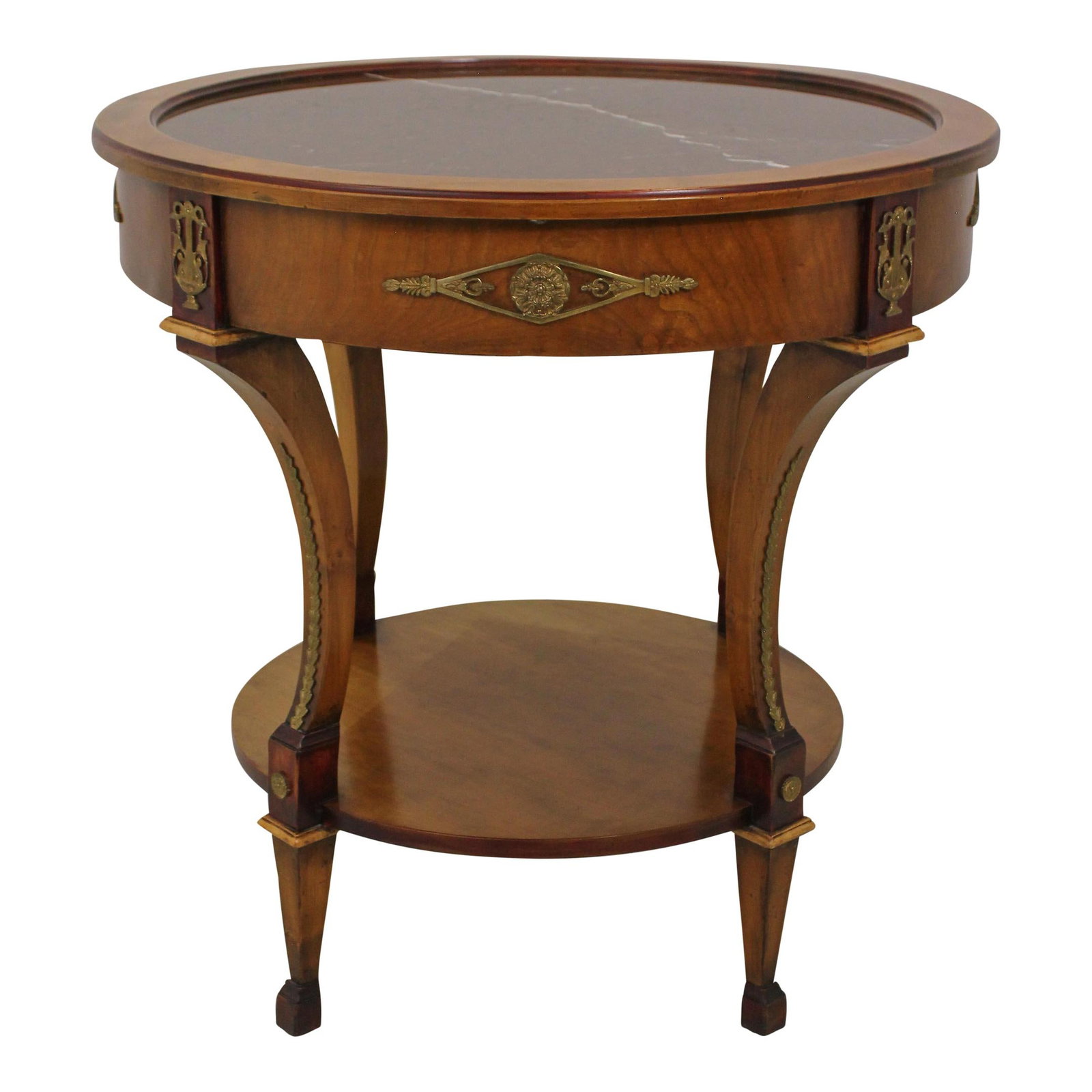 French Neoclassical Round Marble Top Lamp Table with Ormolu Mounts: French Neoclassical Round Marble Top Lamp Table with Ormolu Mounts This exquisite Round French Neoclassical Design Lamp Table features a stunning marble top and is approximately 30 years old. Crafted 