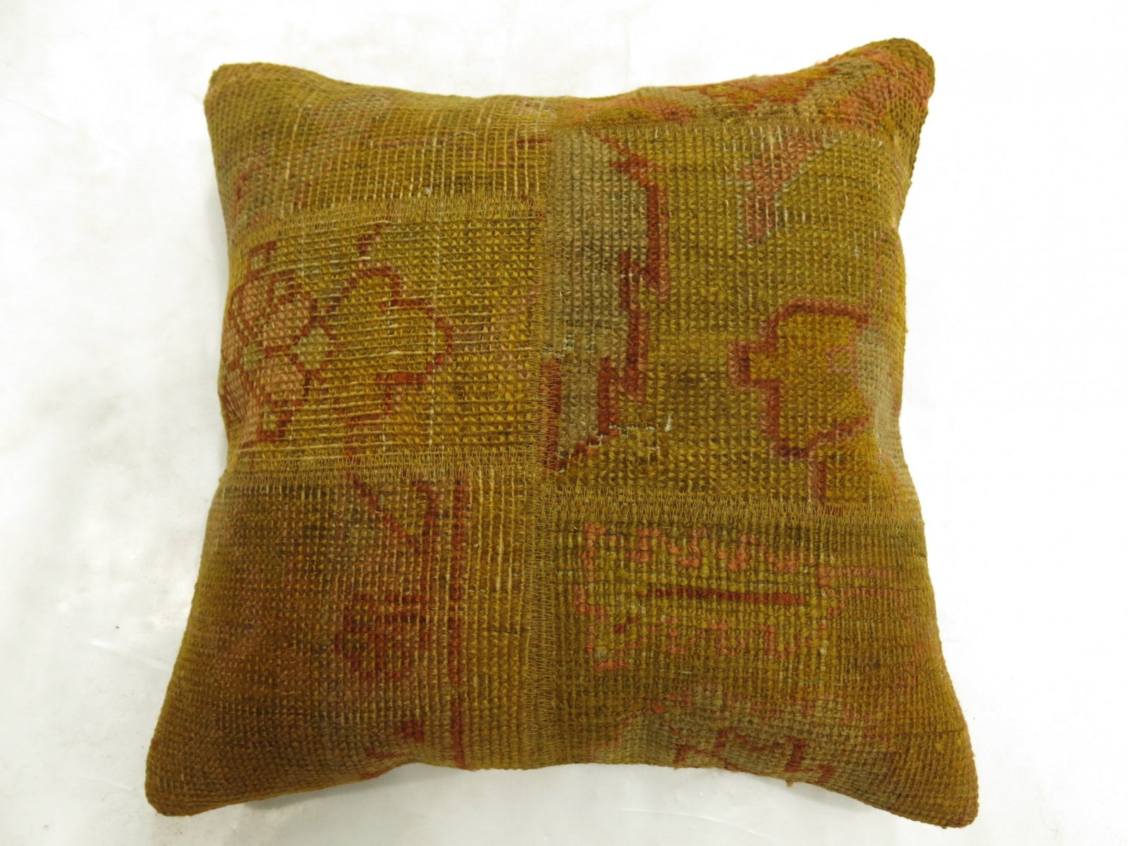 19th Century Oushak Rug Pillow in Patchwork 1' 5" x 1' 5": 19th Century Oushak Rug Pillow in Patchwork 1' 5" x 1' 5" Decorative pillow made from a 19th century Oushak rug in a patchwork format. This pre-owned piece combines antique rug material with a compact