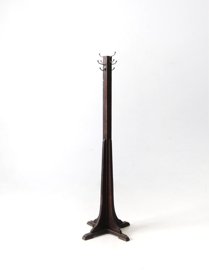 Vintage Mission Style Wooden Coat Rack with Brass Hooks: Vintage Mission Style Wooden Coat Rack with Brass Hooks Enhance your space with this charming antique wooden coat rack, showcasing a classic Mission style design. This hall tree features a sturdy soli