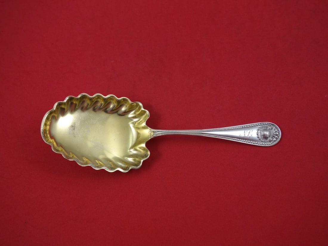 Whiting Bead Sterling Silver Berry Serving Spoon Gold Washed Fluted 7 3/4: Whiting Bead Sterling Silver Berry Serving Spoon Gold Washed Fluted 7 3/4 A Whiting Bead pattern berry serving spoon in sterling silver with a gold-washed, fluted design. It dates to the 1850-1899 per