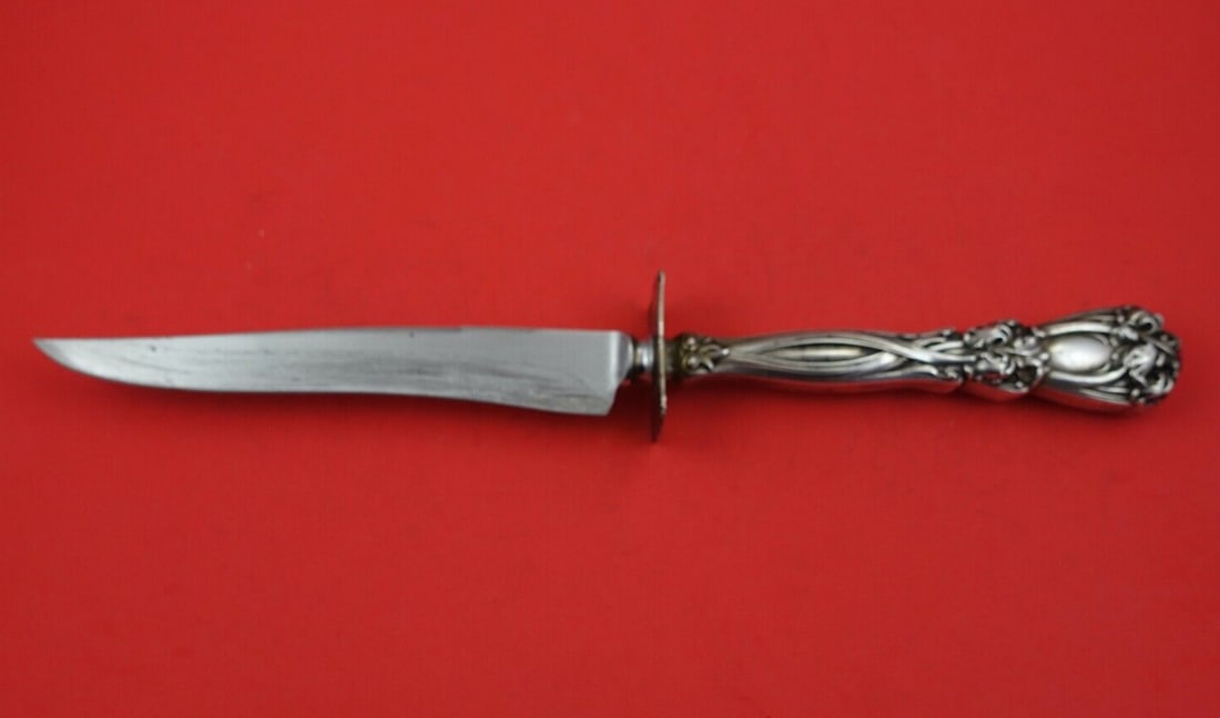 Durgin-Gorham Iris Sterling Silver 13in Roast Carving Knife: Durgin-Gorham Iris Sterling Silver 13in Roast Carving Knife This is an Iris pattern roast carving knife by Durgin-Gorham, made in sterling silver and measuring 13 inches. It is not monogrammed and is 