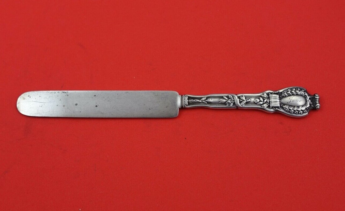 Durgin Du Barry Sterling Silver 7 Inch Dessert Knife Monogrammed: Durgin Du Barry Sterling Silver 7 Inch Dessert Knife Monogrammed This exquisite dessert knife, crafted by Durgin in the elegant Du Barry pattern, is made of high-quality sterling silver. Measuring 7 i