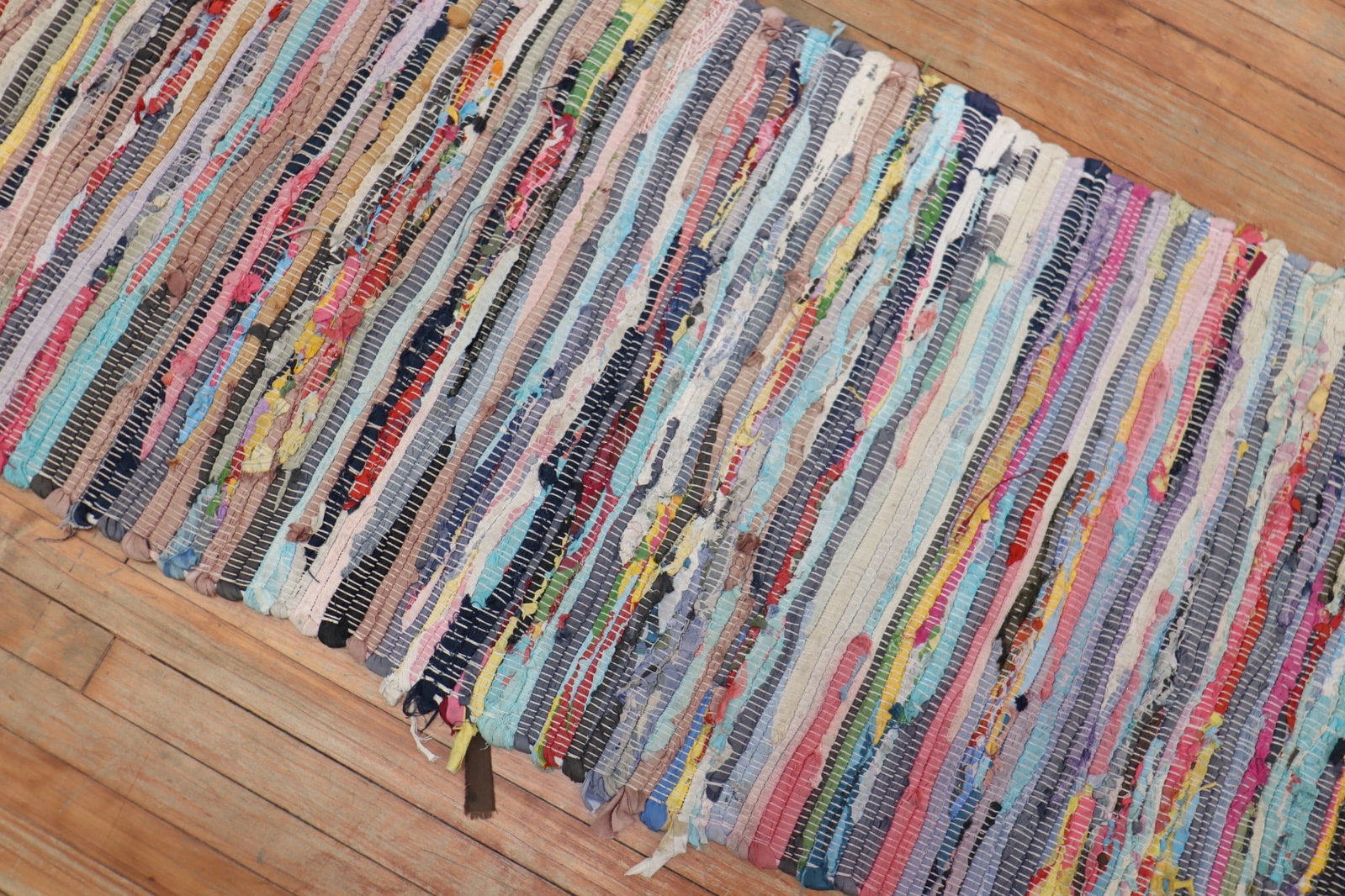 2' 6" x 9' 1" Multicolor American Braided Rug Runner: 2' 6" x 9' 1" Multicolor American Braided Rug Runner One-of-a-kind American braid runner from the late 20th century with a colorful design. American braided rugs were traditionally made from repurpose