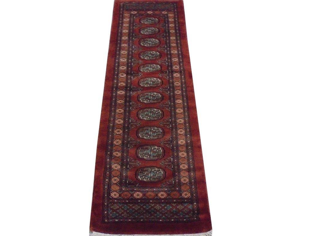 Handmade 6.5 x 2.1 Fire Orange Mori Bokhara Wool Rug: Handmade 6.5 x 2.1 Fire Orange Mori Bokhara Wool Rug Free continental US Shipping Elevate your living space with the exquisite 6.5 x 2.1 Fire Orange Mori Bokhara Rug. This stunning rug features a vivi