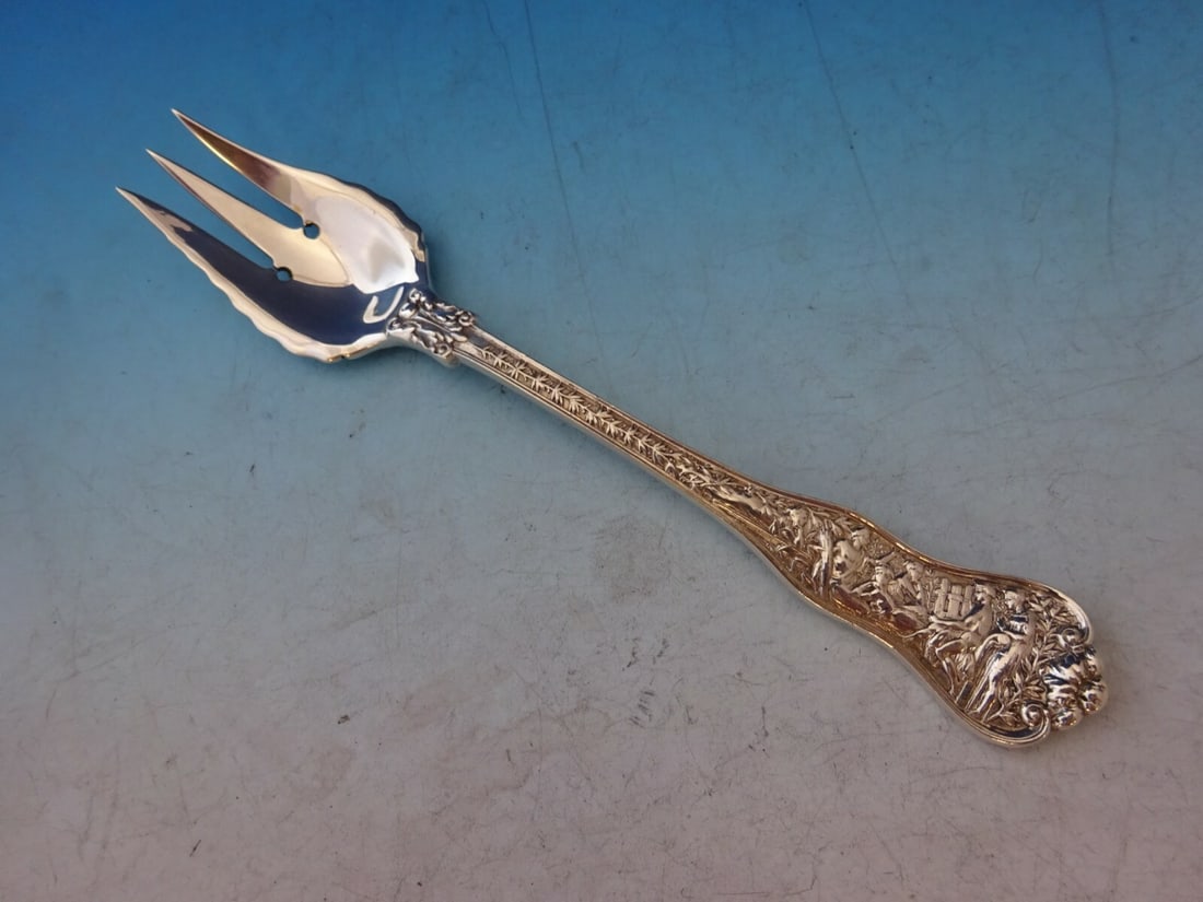 Tiffany & Co Olympian Sterling Silver Salad Fork 3-Tine Ruffled: Tiffany & Co Olympian Sterling Silver Salad Fork 3-Tine Ruffled Elevate your dining experience with this exquisite Olympian salad fork by Tiffany & Co. Crafted from high-quality sterling silver, this 