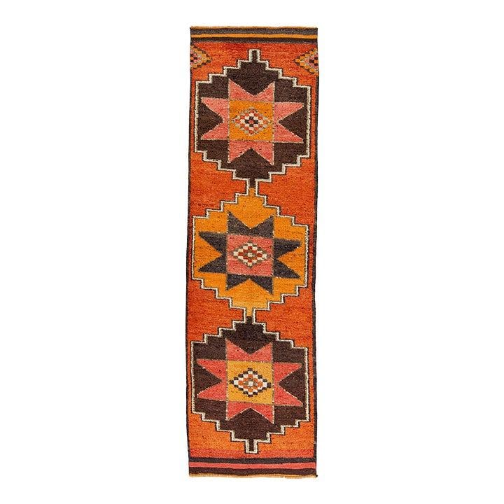 Burnt Orange Turkish Wool Runner Rug with Tribal Anatolian Geometric Design 3 x 10: Burnt Orange Turkish Wool Runner Rug with Tribal Anatolian Geometric Design 3 x 10 This vintage Turkish wool runner is handwoven and features bold geometric medallions in a warm, burnt orange palette 