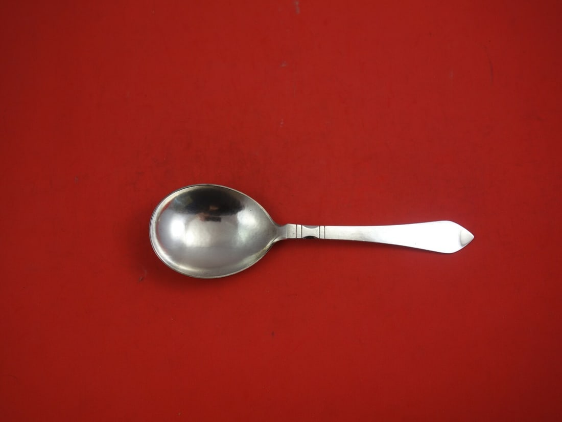 Georg Jensen Continental Sterling Silver Berry Spoon 8": Georg Jensen Continental Sterling Silver Berry Spoon 8" This exquisite Continental Berry Spoon, crafted by Georg Jensen, showcases the timeless elegance of sterling silver. Measuring 8 inches in lengt
