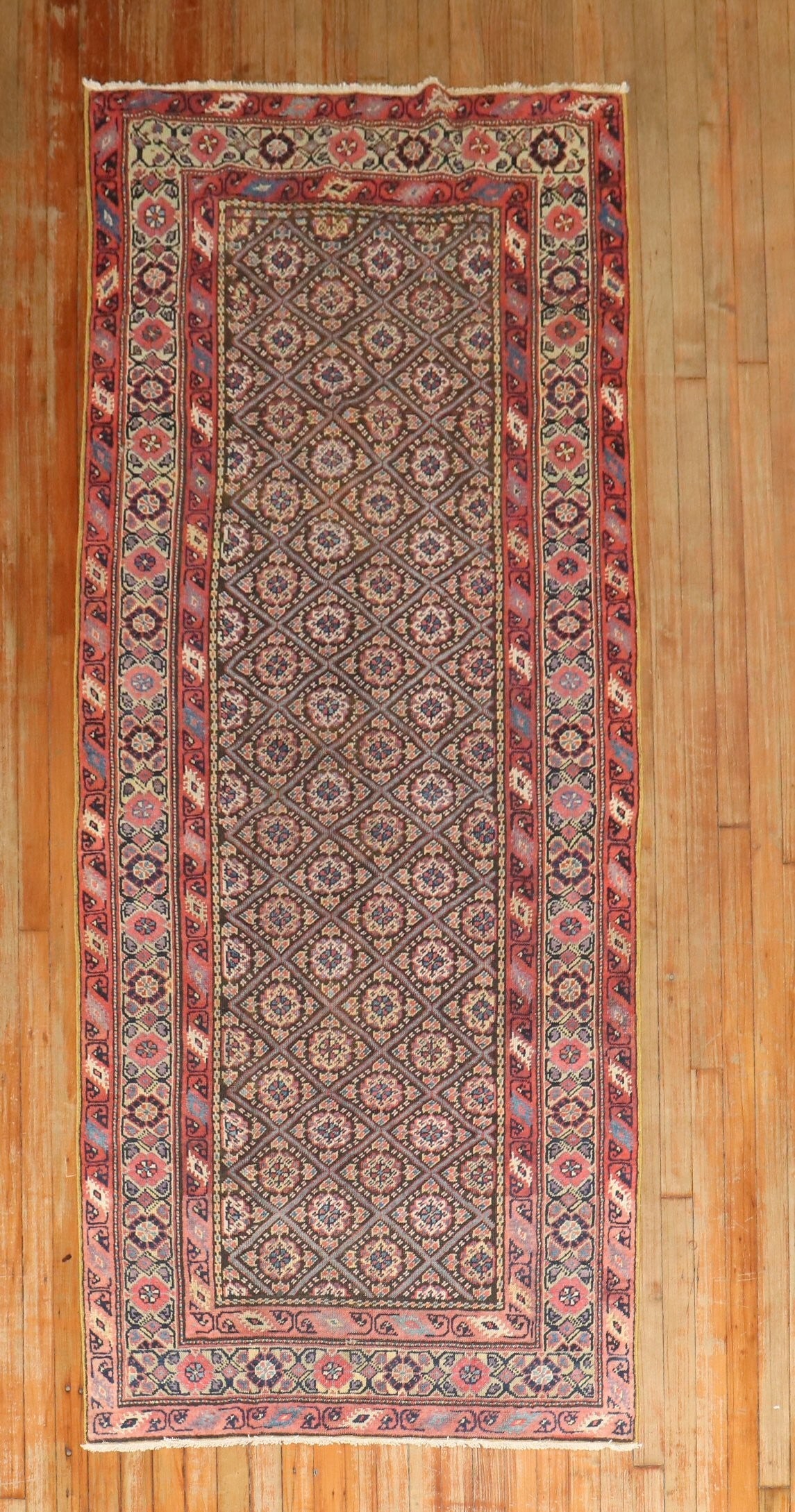 3' 5" x 8' 2" Persian Ferehan Rug Runner 1930s: 3' 5" x 8' 2" Persian Ferehan Rug Runner 1930s Antique Persian Ferehan runner from the 1930s with a traditional geometric design. This pre-owned rug is categorized as a runner and presents the classic