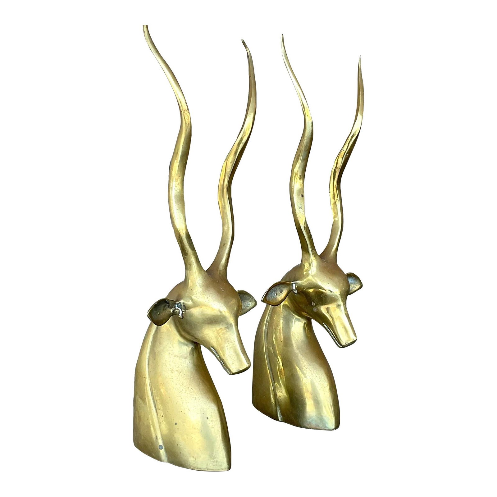 Chic Vintage Boho Brass Antelope Bookends Pair: Chic Vintage Boho Brass Antelope Bookends Pair Enhance your decor with this stunning pair of vintage Boho brass antelope bookends. Each bookend features a chic antelope design complete with long, glam