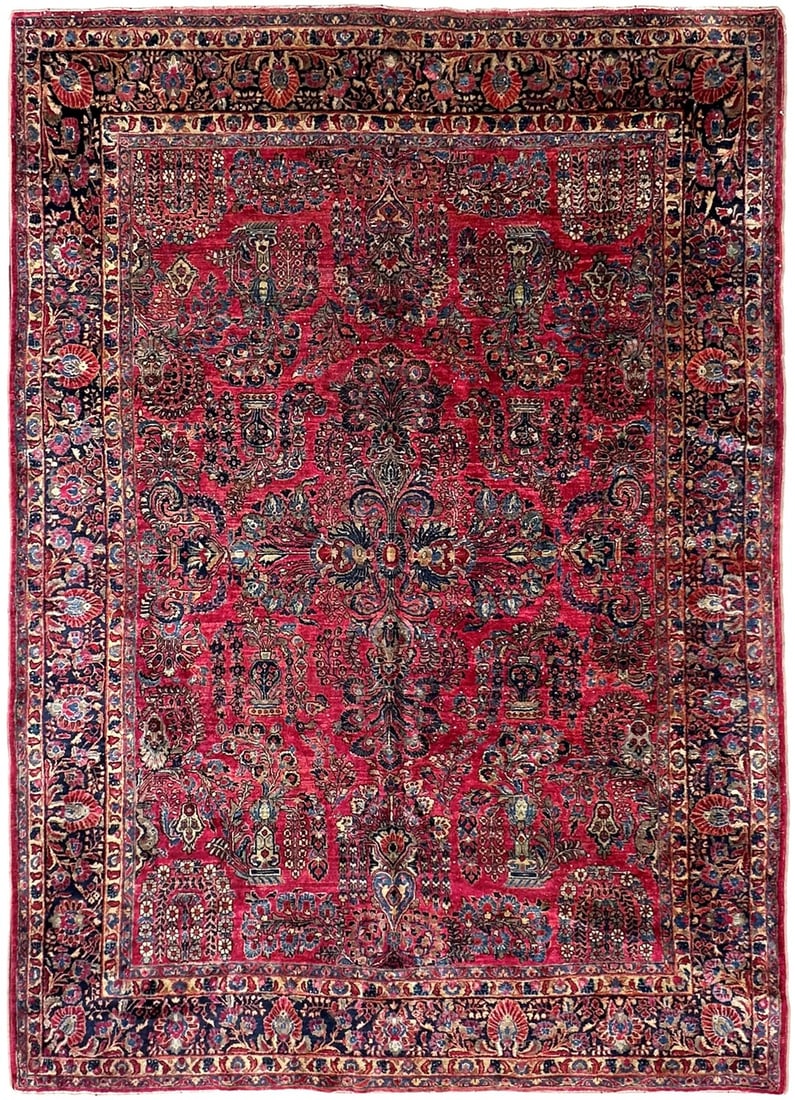 267cm x 346cm Red Wool Hand Knotted Antique Floral Medallion Rug: 267cm x 346cm Red Wool Hand Knotted Antique Floral Medallion Rug An original antique Persian traditional rug with a dense floral medallion pattern in a deep red field, accented with navy and cream. It