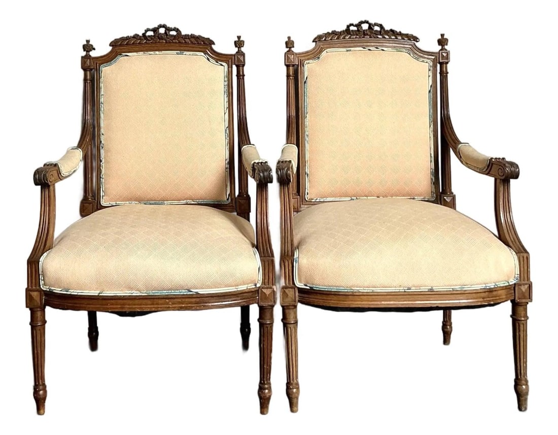 Pair of Hand-Carved Walnut Fauteuil Armchairs with Chinoiserie Upholstery: Pair of Hand-Carved Walnut Fauteuil Armchairs with Chinoiserie Upholstery This pair of vintage Regency Fauteuil armchairs showcases elegant Neoclassical and Louis XVI design influences, complemented b
