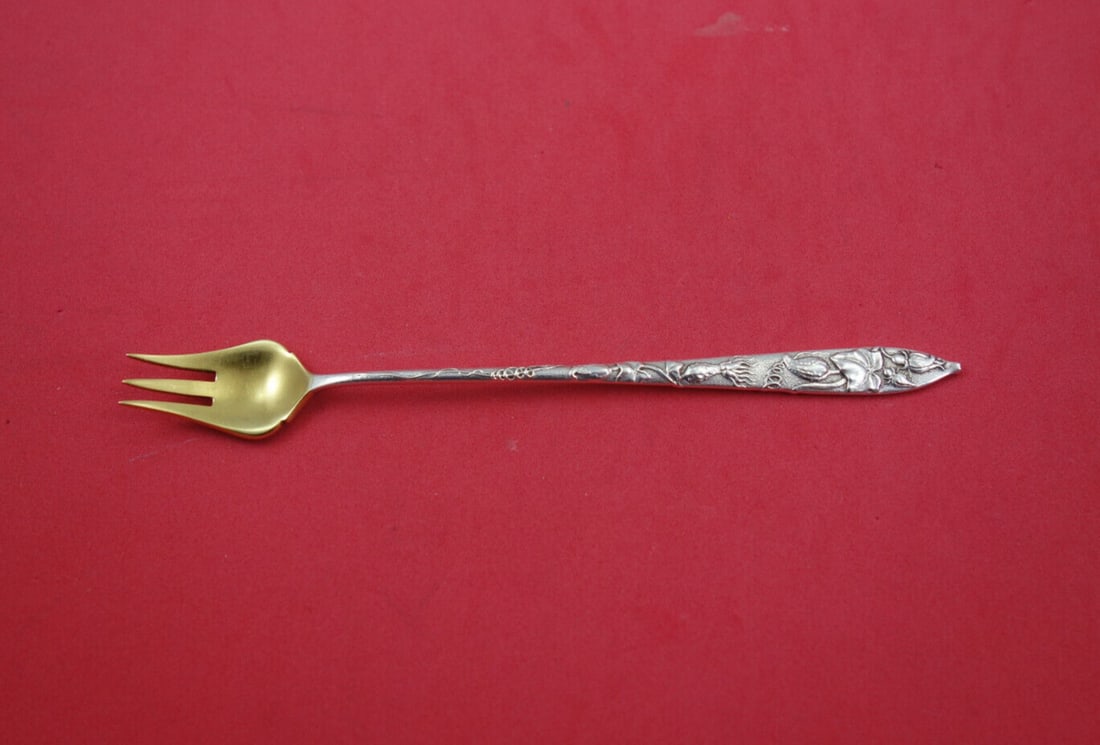 Tiffany & Co. Vine Sterling Silver Cocktail Fork 6" Gold Wash Squash Motif: Tiffany & Co. Vine Sterling Silver Cocktail Fork 6" Gold Wash Squash Motif This exquisite 6" cocktail fork from the Vine pattern by Tiffany & Co. showcases the elegance and artistry of sterling silver