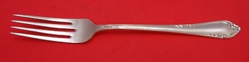 Reed and Barton Dancing Flowers Sterling Silver Dinner Fork 7 5/8": Reed and Barton Dancing Flowers Sterling Silver Dinner Fork 7 5/8" Add a touch of elegance to your dining experience with this exquisite dinner fork from Reed and Barton. Crafted from high-quality ste