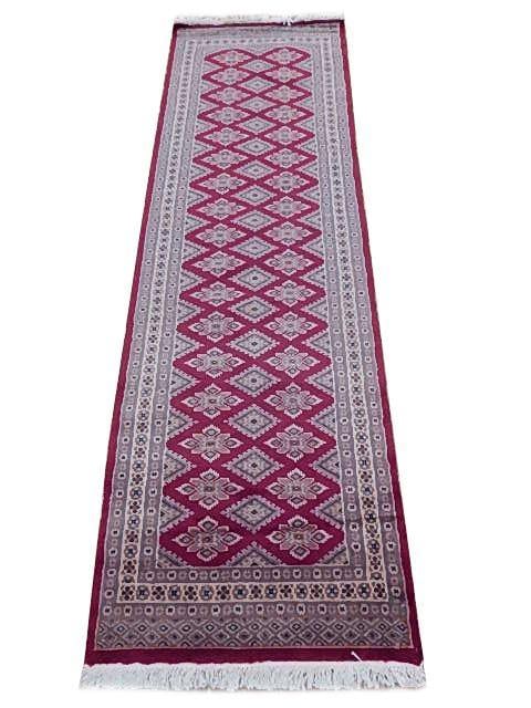 Handmade 2.6 x 8.2 Pinkish Red Jaldar Bokhara Wool Rug: Handmade 2.6 x 8.2 Pinkish Red Jaldar Bokhara Wool Rug Free continental US Shipping Transform your space with this exquisite Pinkish Red Handmade Jaldar Bokhara Wool Rug, featuring a stunning fusion o