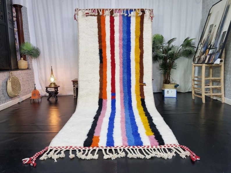 Authentic Handwoven Colorful Rug from Morocco 10 x 3.28 Feet: Authentic Handwoven Colorful Rug from Morocco 10 x 3.28 Feet Experience the charm of Moroccan craftsmanship with this authentic Soft Colorful Rug, handwoven in the Atlas Mountains by skilled Berber wo
