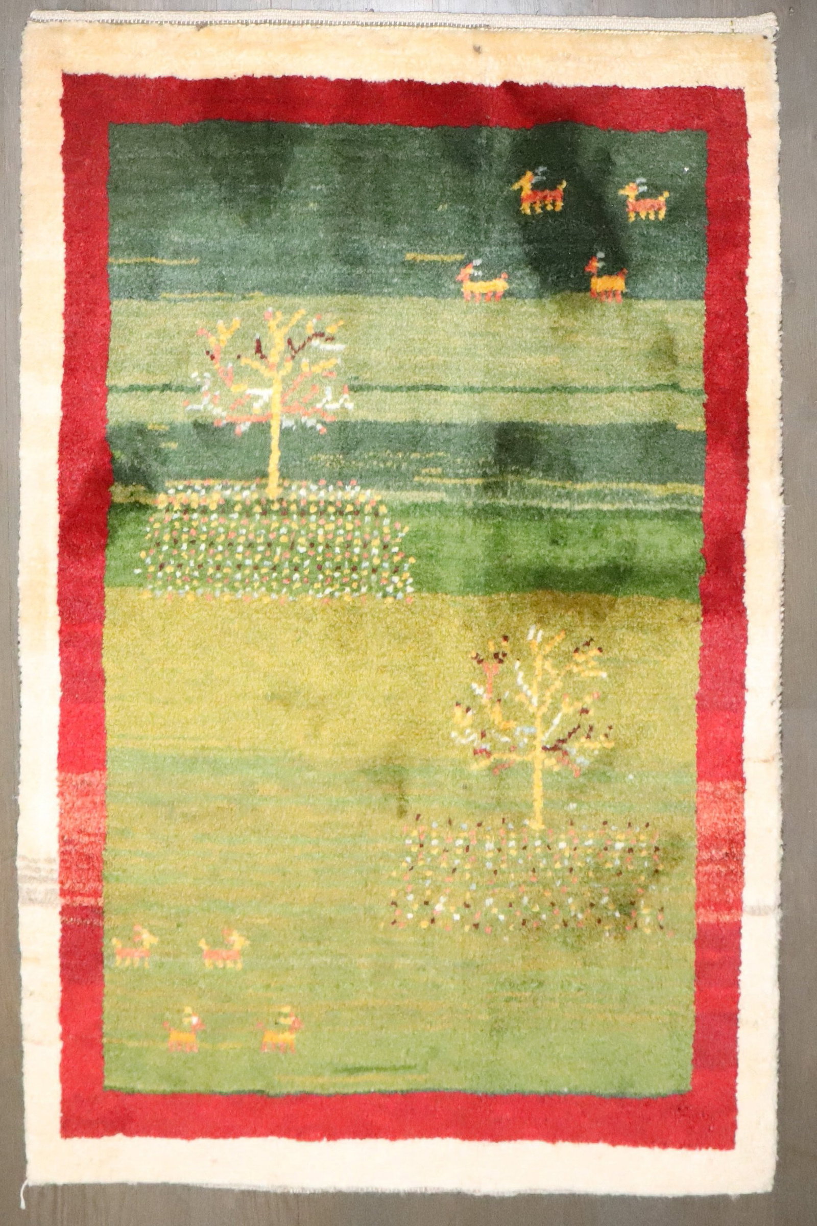 2' 8" x 3' 10" Persian Gabbeh Rug in Green: 2' 8" x 3' 10" Persian Gabbeh Rug in Green A 21st century Persian Gabbeh rug in a predominantly bright green colorway. This pre-owned small rug is identified as a reproduction. Specifications Title: B