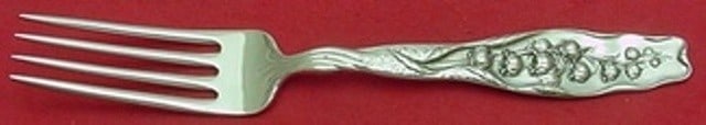 Whiting Lily of the Valley sterling dinner fork 7 1/2 in.: Whiting Lily of the Valley sterling dinner fork 7 1/2 in. Sterling silver dinner fork in the Lily of the Valley pattern by Whiting. This pre-owned piece is not monogrammed and is in excellent conditio