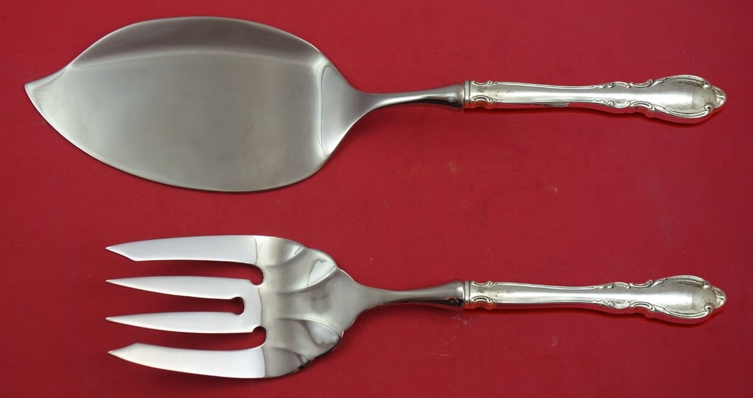 Towle Legato 2-piece sterling silver fish serving set custom made: Towle Legato 2-piece sterling silver fish serving set custom made Custom made 2-piece salmon serving set in the Legato pattern by Towle. This pre-owned set features sterling silver hollow handles with