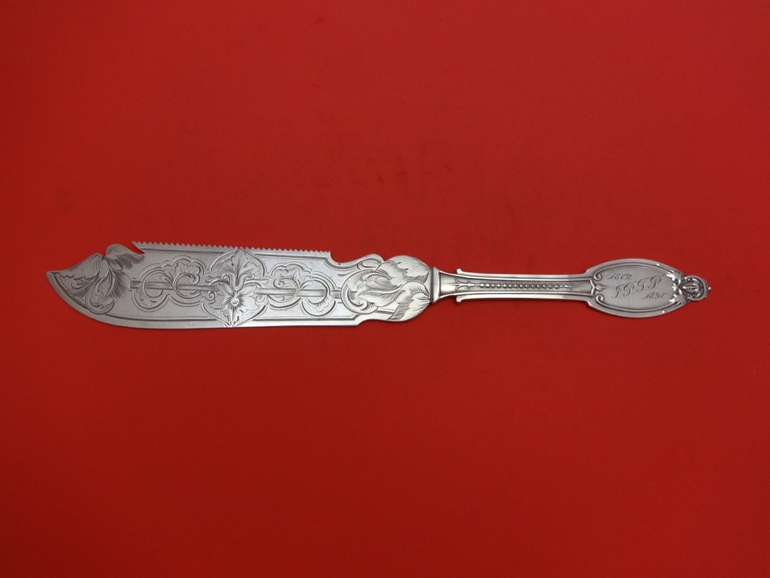 Albert Coles Kenilworth Sterling Silver Cake Knife 11.25 Serrated Brite-Cut: Albert Coles Kenilworth Sterling Silver Cake Knife 11.25 Serrated Brite-Cut This Kenilworth cake knife, crafted by Albert Coles, features a serrated Brite-Cut blade and is made of high-quality sterlin