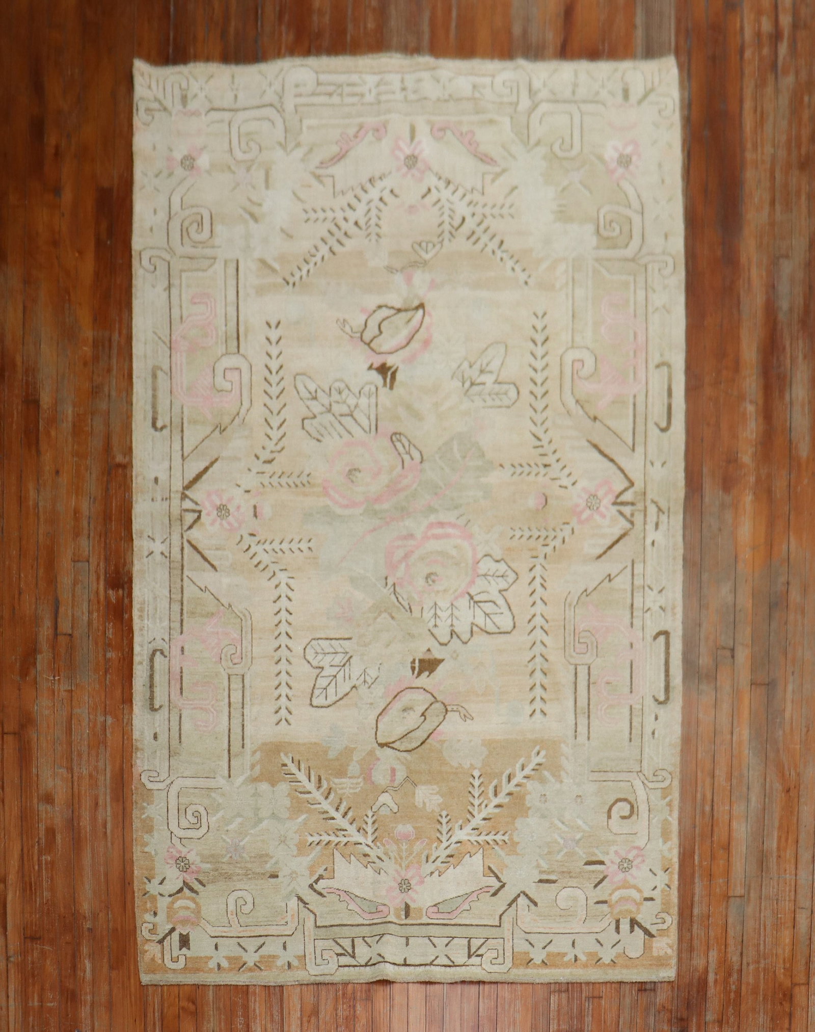 1930s Khotan Samarkand Rug 5' 10" x 9' 3" Neutral Tones: 1930s Khotan Samarkand Rug 5' 10" x 9' 3" Neutral Tones Vintage 1930s Samarkand Khotan rug in a neutral palette with pink accents. This pre-owned rug features floral motifs and a geometric border desi