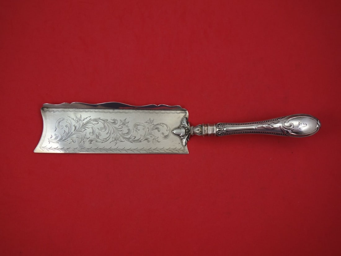 Tifft and Whiting 12 Inch Sterling Silver Crumber with Acorn Design: Tifft and Whiting 12 Inch Sterling Silver Crumber with Acorn Design This exquisite crumber, crafted by Tifft and Whiting, showcases a stunning hollow handle design in all-sterling silver. Measuring 12