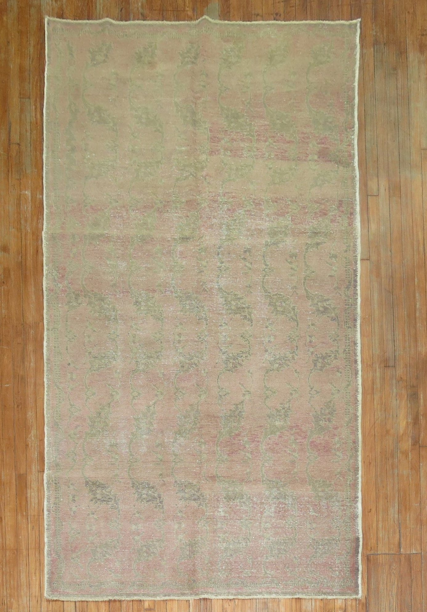 5' 5" x 9' 3" Mid 20th Century Turkish Deco Anatolian Rug: 5' 5" x 9' 3" Mid 20th Century Turkish Deco Anatolian Rug Vintage Turkish Deco rug in a dusty blush tone with an Anatolian character and a shabby chic look. This mid-20th century area rug features an 