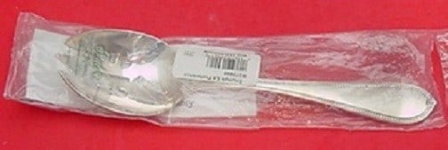 Tuttle Triumph Sterling Silver 9 Inch Slotted Serving Spoon New: Tuttle Triumph Sterling Silver 9 Inch Slotted Serving Spoon New This exquisite serving spoon is a 9-inch slotted piece from the Triumph pattern by Tuttle, crafted from high-quality sterling silver. It