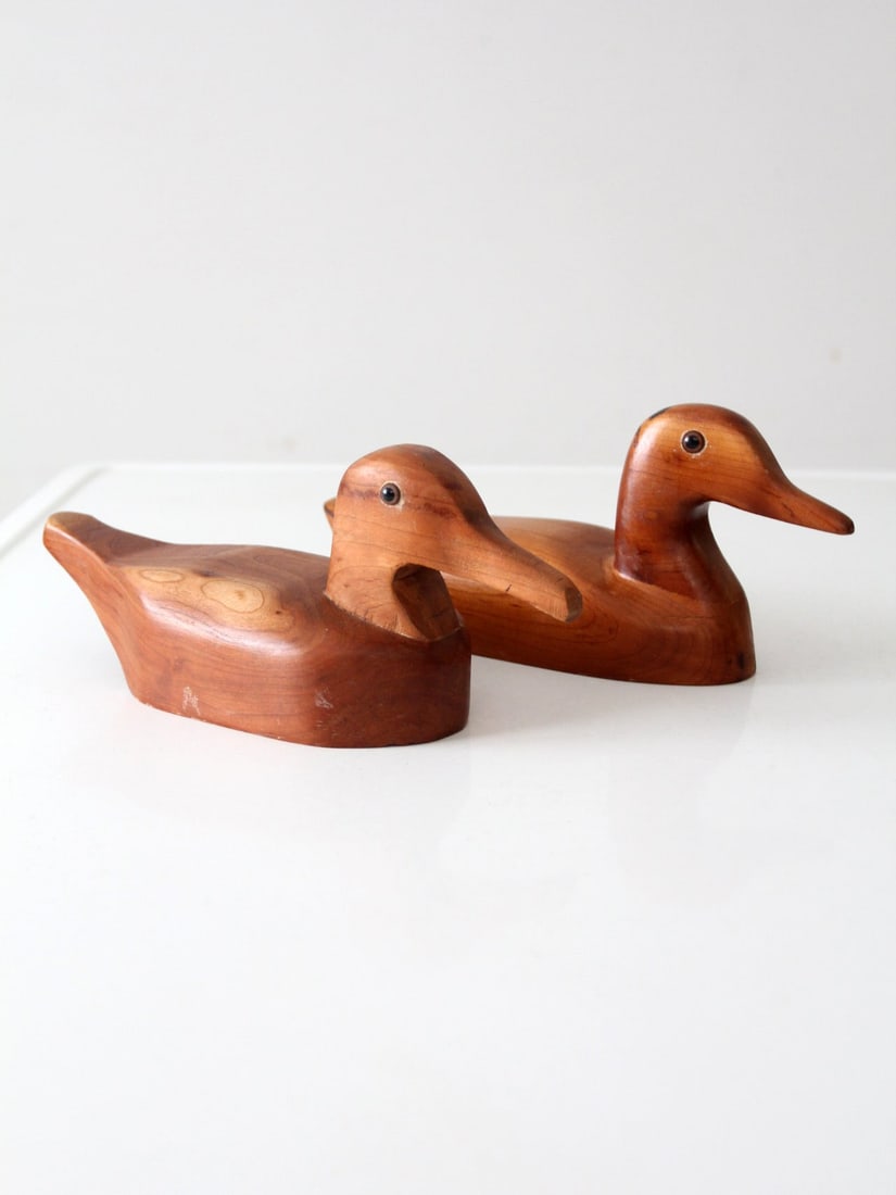 Hand-Carved Vintage Wood Duck Figurines Pair 11 inches: Hand-Carved Vintage Wood Duck Figurines Pair 11 inches This exquisite pair of vintage hand-carved wood duck figurines showcases the unique character of the wood with beautiful lines and details. Each 