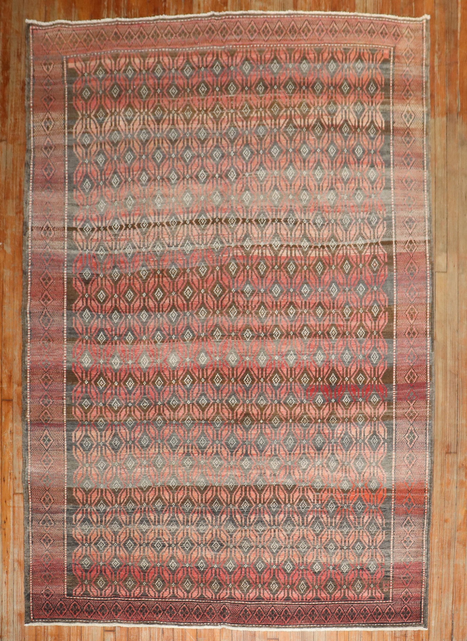 6' 8" x 9' 4" Turkish Anatolian Tribal Rug: 6' 8" x 9' 4" Turkish Anatolian Tribal Rug Rustic mid-20th century Turkish tribal rug with an Anatolian design. This pre-owned rectangular woven rug features a geometric pattern with diamond motifs in