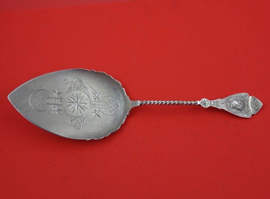Wood & Hughes Victorian Sterling Silver Pie Server Medallion with Twist 10 1/8 in: Wood & Hughes Victorian Sterling Silver Pie Server Medallion with Twist 10 1/8 in This exquisite Victorian-style pie server features a flat handle made of sterling silver, showcasing the elegant 'Meda