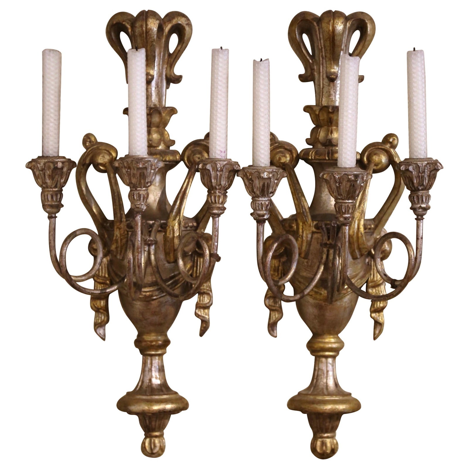 Set of 2 Italian Silver Leaf and Gilt Carved Wall Sconces Circa 1970: Set of 2 Italian Silver Leaf and Gilt Carved Wall Sconces Circa 1970 This pair of mid-century Italian wall sconces features elegant hand-carved vases with draped swag embellishments and leaf motif dec