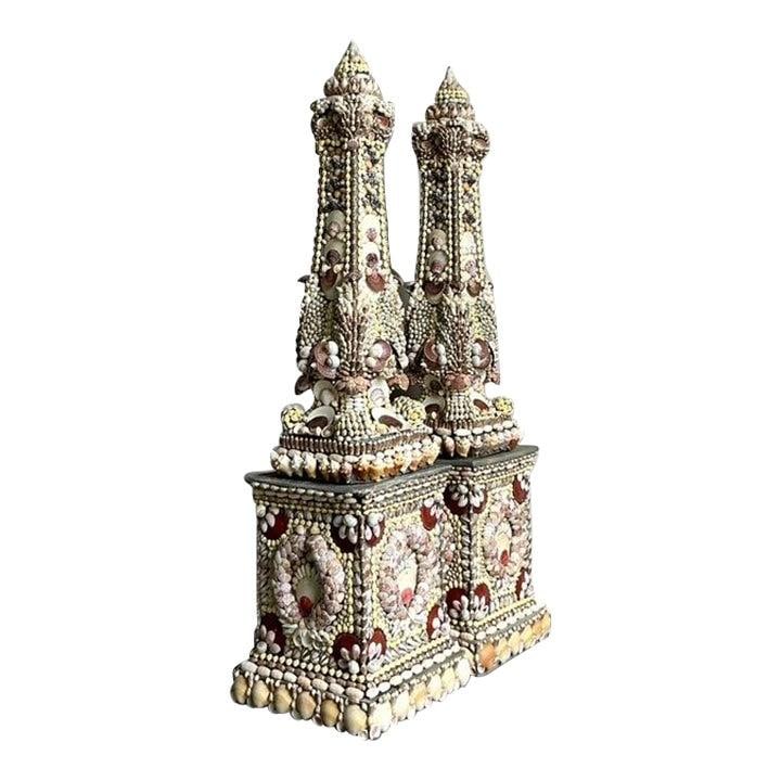 Pair of Monumental Shell Mosaic Obelisks with Hand-Encrusted Seashells: Pair of Monumental Shell Mosaic Obelisks with Hand-Encrusted Seashells This exceptional pair of vintage monumental obelisks is meticulously hand-encrusted with a diverse selection of natural seashells